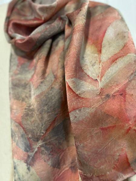 Terracotta colors with printed leaves on satin silk scarf