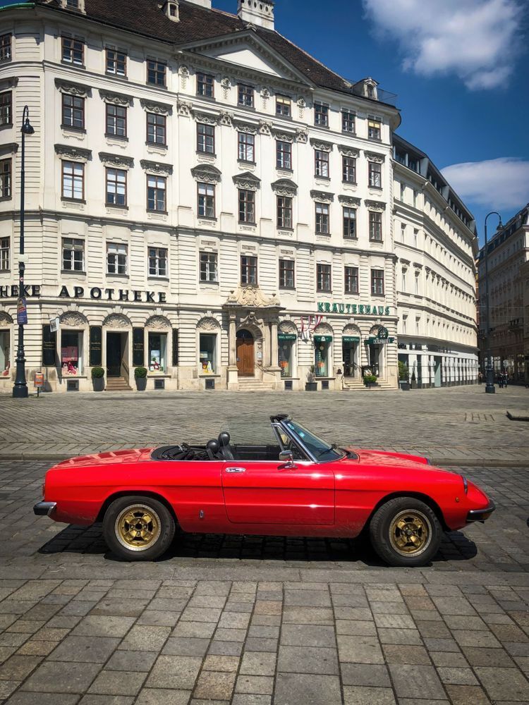 Red Alfa Romeo in Vienna Austria Art Print | Studio Petrino - Classic European Car Art